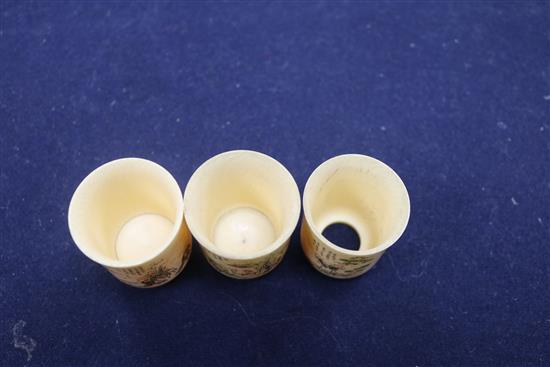 Three Chinese ivory cups, Republic period and four Japanese miniature ivory figures of immortals